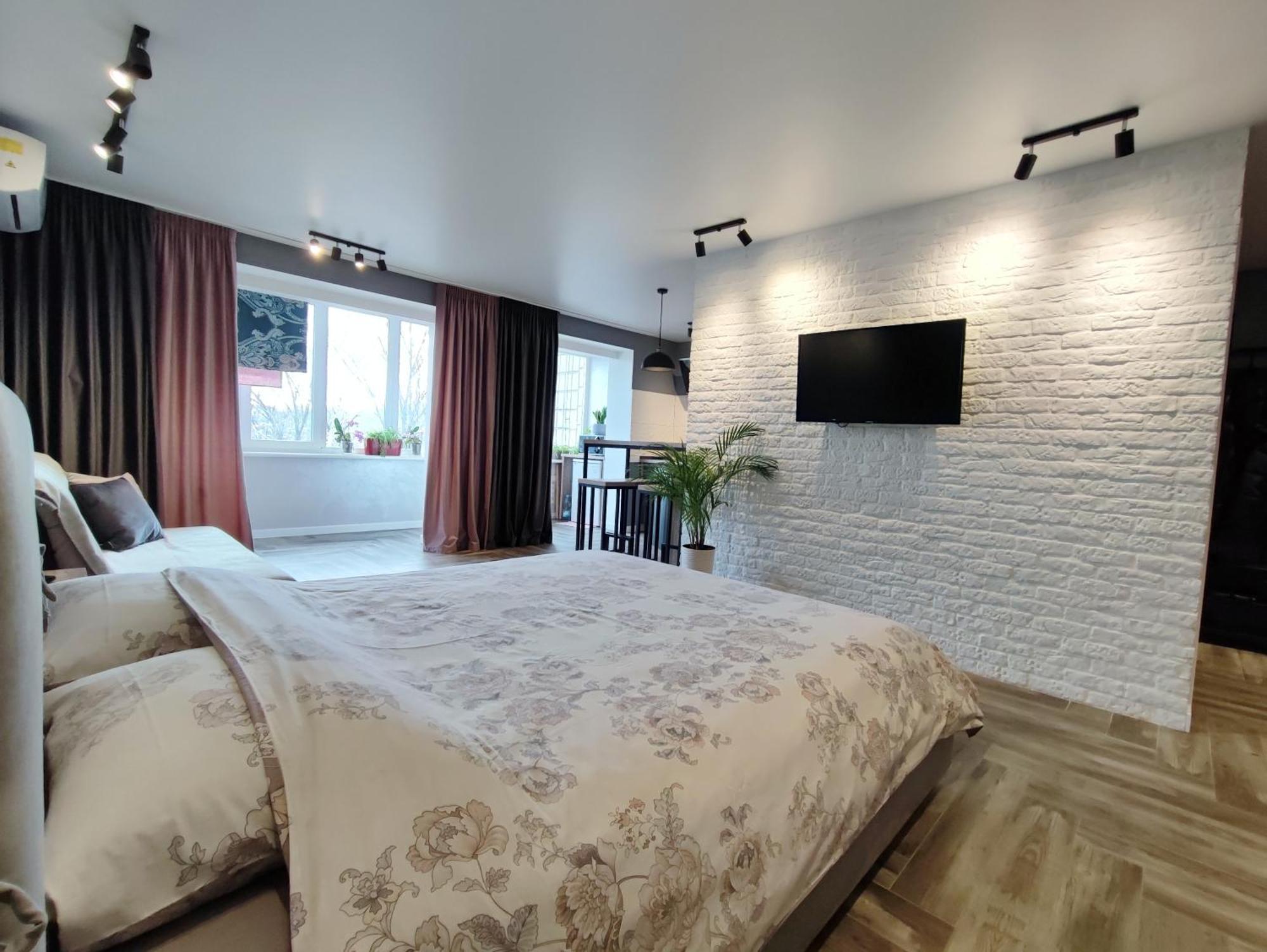 уютная возле бц Tower, концерт-холл оазис Apartment *